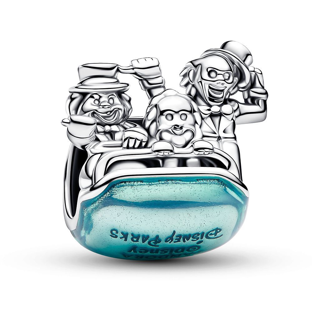 Charm de la mansión embrujada con tres fantasmas en un carrito