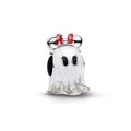 Charm de Minnie disfrazada de fantasma con moño rojo