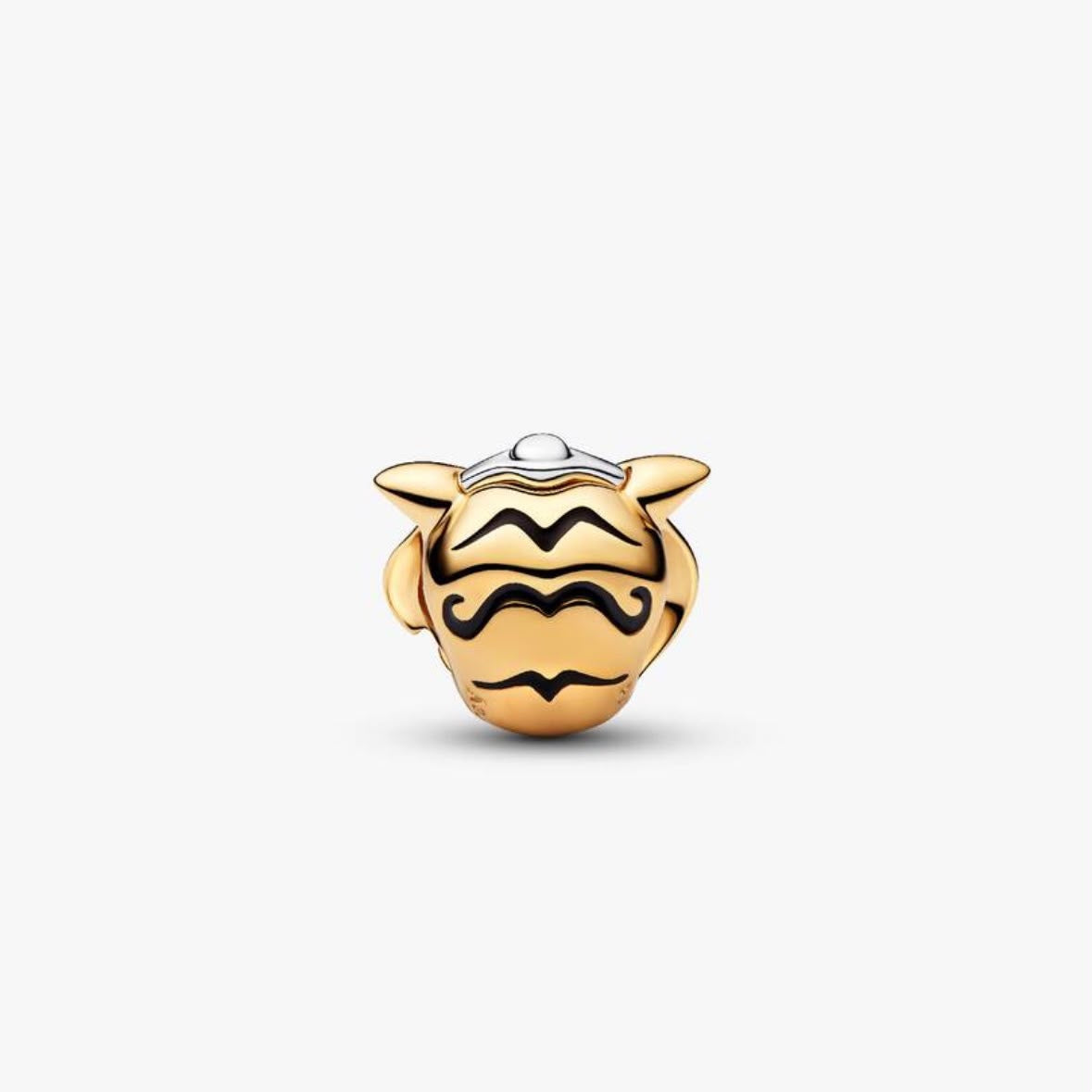 Charm de Rajah visto por arriba, dorado con esmalte negro